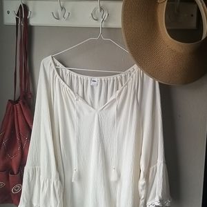 Flowy boho top with bell sleeves and crochet accen